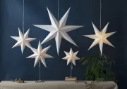 Star trading Papīra zvaigzne uz statīva